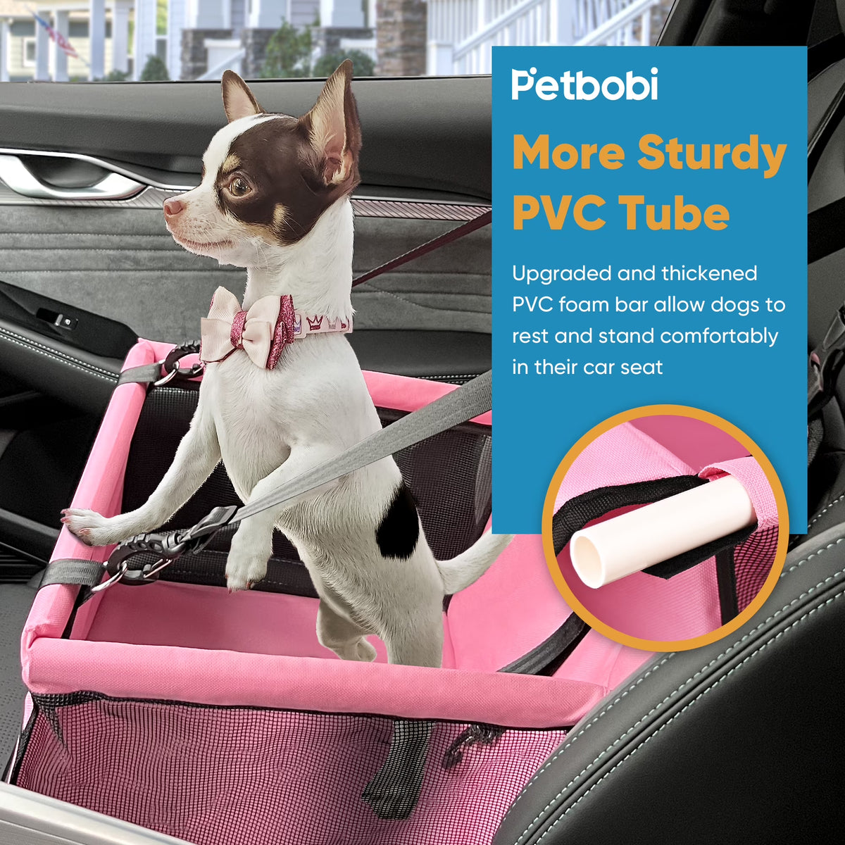 Pink dog car booster seat with safety leash — shown in a home setting