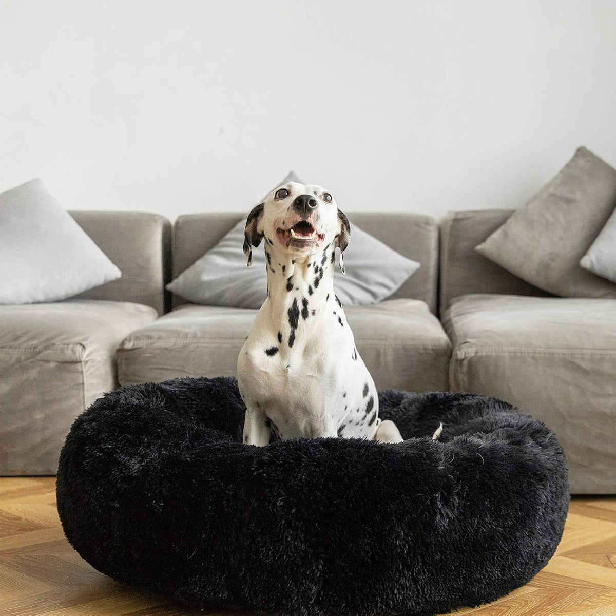 Calming donut cuddler pet bed in plush shag fur — close-up of texture and finish